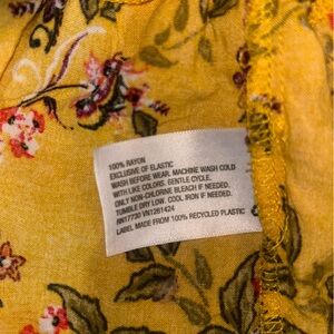 Yellow and floral long art class dress. Girls size small (6-7).